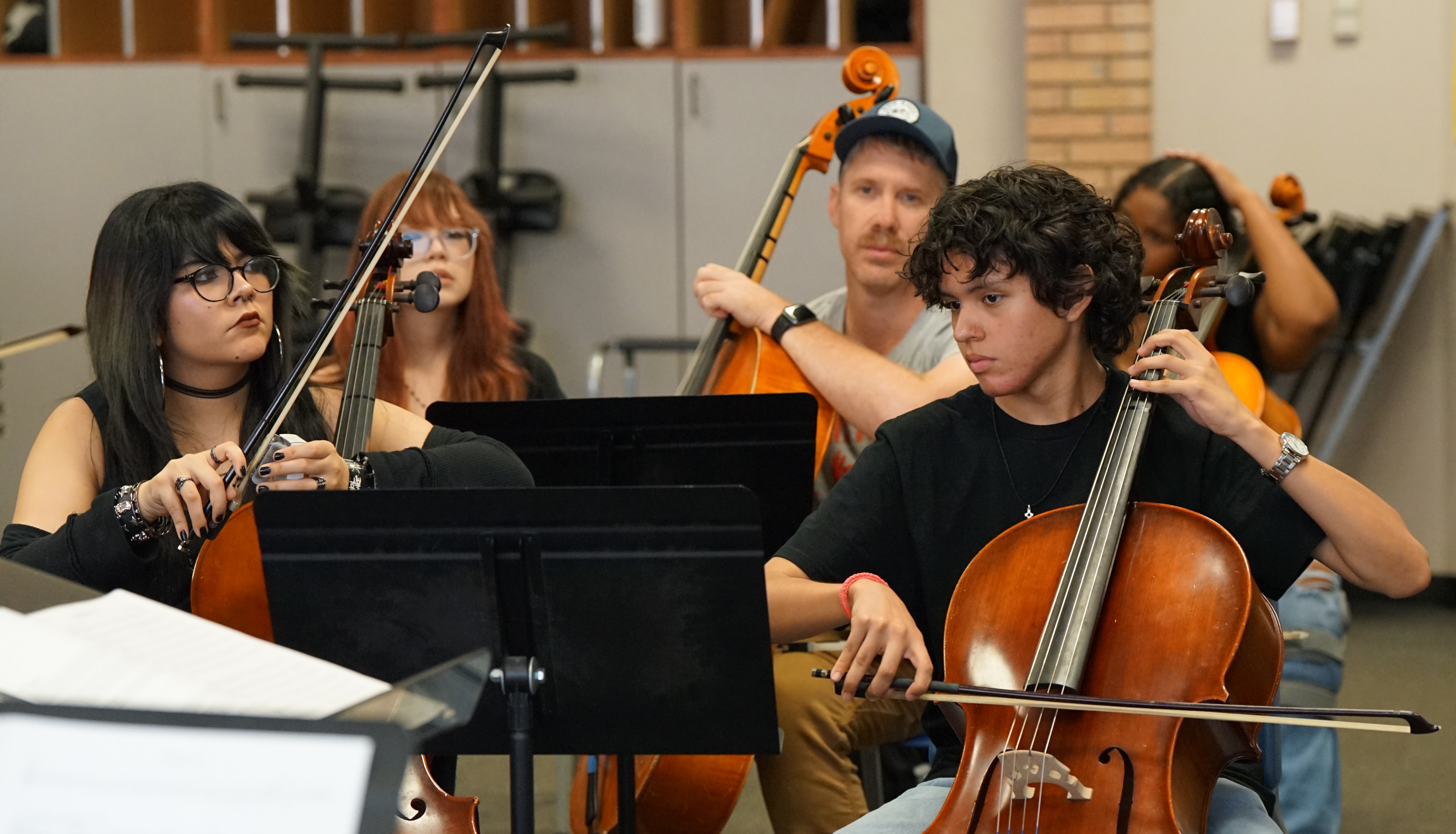 Orchestra students practice on the second day of school