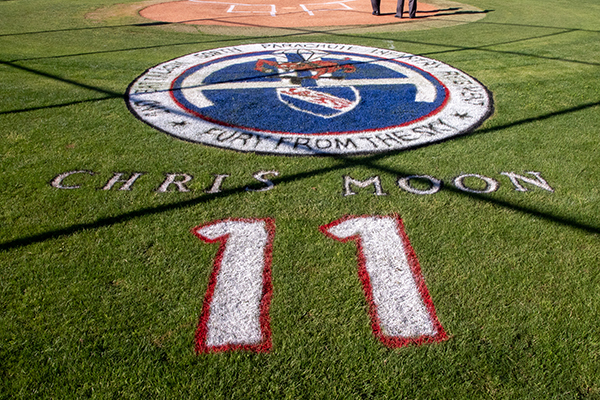 The field decorated with a shield and Chris Moon and number 11