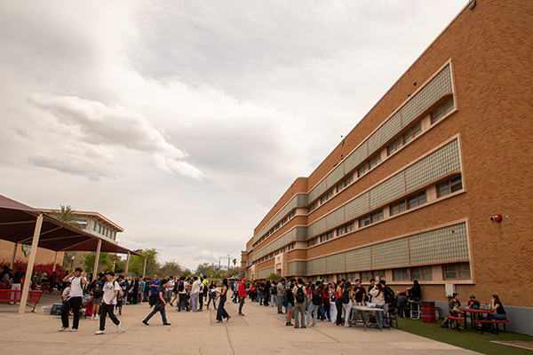 Students walk around campus during the mental health fair
